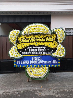 Papan Bunga Duka di Topo Tiga
