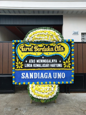 Papan Bunga Duka di Topo Tiga
